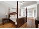 Bedroom with hardwood floors and a large bay window which adds natural lighting at 706 Registry Run, Kennesaw, GA 30152
