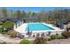Enjoy the community pool with a covered picnic area and lounge chairs surrounded by professional landscaping at 706 Registry Run, Kennesaw, GA 30152