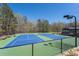 Enjoy the outdoors at these community tennis courts with lighting, benches, and beautiful landscaping at 706 Registry Run, Kennesaw, GA 30152
