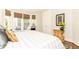 Cozy bedroom featuring a large bay window and neutral decor at 825 Glengate Pl, Atlanta, GA 30328