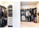 Walk-in closet providing ample storage with shelving, drawers, and hanging rods for organized wardrobe solutions at 825 Glengate Pl, Atlanta, GA 30328