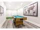 Entertainment area with a pool table and a mini golf setup for recreation and leisure at 825 Glengate Pl, Atlanta, GA 30328