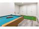 Game room featuring a pool table and a putting green, perfect for leisure and entertainment at 825 Glengate Pl, Atlanta, GA 30328
