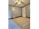 Simple bedroom features plush carpeting and neutral paint, offering a blank canvas for personalization at 1320 Milstead Ne Ave, Conyers, GA 30012