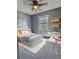Inviting bedroom featuring twin beds, playful decor, and a cozy atmosphere for children at 1320 Milstead Ne Ave, Conyers, GA 30012