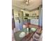Bright kitchen with a glass table and stainless steel appliances, perfect for casual dining at 1320 Milstead Ne Ave, Conyers, GA 30012