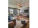 Cozy living room with modern furniture, a soft rug, and a mounted television at 1320 Milstead Ne Ave, Conyers, GA 30012
