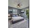 Comfortable main bedroom features neutral walls, carpet, and large windows at 1320 Milstead Ne Ave, Conyers, GA 30012