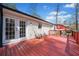 The back deck has a grill and several places to sit and enjoy the fresh air at 181 Bridgewood Se Dr, Conyers, GA 30094