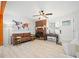 Cozy living room featuring refinished floors, a decorative fireplace, and ample natural light at 181 Bridgewood Se Dr, Conyers, GA 30094