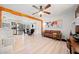 Spacious living room featuring an open layout with newly refinished floors and modern decorations at 181 Bridgewood Se Dr, Conyers, GA 30094