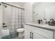 Modern bathroom with a vanity and shower at 396 Academy St, Alpharetta, GA 30009