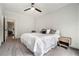 Bedroom with plush carpet, a window and view to the sitting area at 396 Academy St, Alpharetta, GA 30009