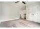 Spacious bedroom with hardwood floors, and neutral colored walls at 396 Academy St, Alpharetta, GA 30009