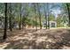 Lot with mature trees provides a serene setting for a stunning modern home at 396 Academy St, Alpharetta, GA 30009