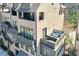Elegant townhome with multiple levels, balconies, and outdoor seating areas at 6601 Cadence Blvd, Atlanta, GA 30328
