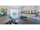 Well-equipped gym featuring modern cardio machines, weightlifting benches, and exercise balls for a comprehensive workout at 6601 Cadence Blvd, Atlanta, GA 30328