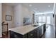 Spacious kitchen with center island that features a stainless steel dishwasher and ample counter space at 6601 Cadence Blvd, Atlanta, GA 30328