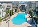 A community swimming pool with lounge chairs and umbrellas offering a place to relax at 6601 Cadence Blvd, Atlanta, GA 30328