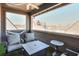 Cozy porch featuring comfortable seating and neighborhood views at 6601 Cadence Blvd, Atlanta, GA 30328
