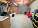 Unfinished basement with exposed studs and concrete walls at 272 Lynshire Sw Ct, Marietta, GA 30064