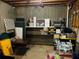 Unfinished basement with concrete walls and floor, and shelving for storage at 272 Lynshire Sw Ct, Marietta, GA 30064