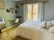 Lovely bedroom with built-in desk space and large window overlooking the yard at 272 Lynshire Sw Ct, Marietta, GA 30064