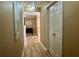 Well-lit hallway showcasing neutral paint colors and modern flooring at 272 Lynshire Sw Ct, Marietta, GA 30064