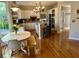 Bright kitchen featuring stainless steel appliances, kitchen island with breakfast bar, and hardwood floors at 272 Lynshire Sw Ct, Marietta, GA 30064