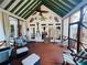 Cozy screened-in porch with rustic décor, comfortable seating, and a view of the backyard at 272 Lynshire Sw Ct, Marietta, GA 30064