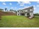 Spacious backyard with lush lawn and patio at 444 Lower Shoreline Ct Sw, Marietta, GA 30064