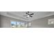 Spacious bedroom with fan and a view at 444 Lower Shoreline Ct Sw, Marietta, GA 30064