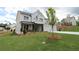 Lovely home with a well-manicured lawn and landscaping, enhancing its curb appeal at 444 Lower Shoreline Ct Sw, Marietta, GA 30064