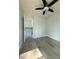 Bedroom with wood-look flooring and a ceiling fan at 5075 Forest Downs Ln, Atlanta, GA 30349