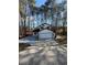 Charming two-story home with a two-car garage and fresh landscaping at 5075 Forest Downs Ln, Atlanta, GA 30349
