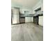Well-equipped kitchen featuring stainless steel appliances and granite countertops at 5075 Forest Downs Ln, Atlanta, GA 30349