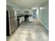 Modern kitchen featuring stainless steel appliances and ample cabinet space at 5075 Forest Downs Ln, Atlanta, GA 30349