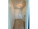 Neutral laundry room with flooring and lots of natural light at 5075 Forest Downs Ln, Atlanta, GA 30349