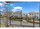 Balcony view showcases well-manicured lawns and various home styles in the neighborhood at 6845 Wesley Hughes Rd, Cumming, GA 30040