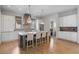 Beautiful kitchen with a center island, stainless steel appliances, and ample storage at 6845 Wesley Hughes Rd, Cumming, GA 30040