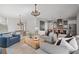 Open living room and kitchen with modern decor and comfortable seating at 6845 Wesley Hughes Rd, Cumming, GA 30040