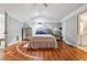 A primary bedroom features a neutral color palette, and ensuite bathroom at 9991 Holly Hill Way, Jonesboro, GA 30238