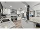 Bright kitchen features stainless steel appliances, granite counters, and white cabinets at 10070 Timberstone Rd, Johns Creek, GA 30022