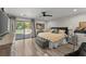 Comfortable main bedroom with a sliding glass door leading to a private deck at 10070 Timberstone Rd, Johns Creek, GA 30022