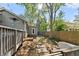 Side yard with stone pathway leading to a detached structure at 10070 Timberstone Rd, Johns Creek, GA 30022