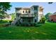 Stunning home with a large deck and lush backyard oasis, perfect for outdoor enjoyment at 1192 Lake Washington Dr, Lawrenceville, GA 30043