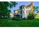 Charming home showcases a multi-level deck and a beautifully manicured backyard space at 1192 Lake Washington Dr, Lawrenceville, GA 30043