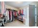 Spacious walk-in closet with plenty of storage for clothing, shoes and accessories at 1192 Lake Washington Dr, Lawrenceville, GA 30043
