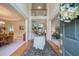 Grand foyer with soaring ceilings, hardwood floors, and elegant décor at 1192 Lake Washington Dr, Lawrenceville, GA 30043