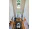 Bright two-story foyer with hardwood floors, white walls, and an elegant chandelier at 1192 Lake Washington Dr, Lawrenceville, GA 30043